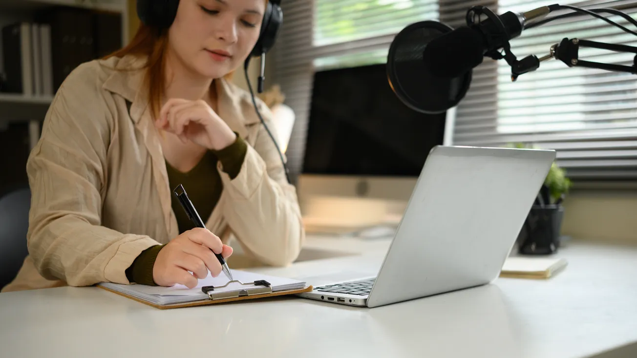 Independent content creator producing and publishing work from a home studio setup.
