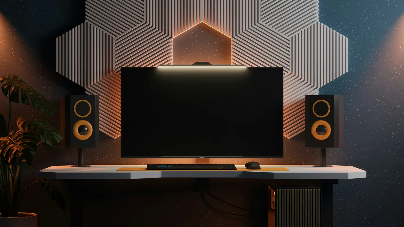 A modern gaming setup features a large monitor with a light bar, flanked by two speakers. A geometric wall pattern adds a stylish backdrop. The scene is moody and sleek.